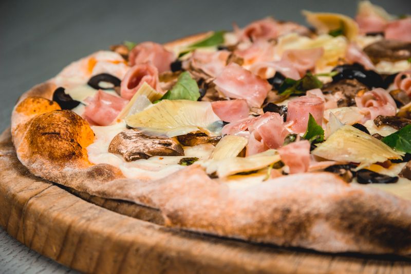 Fresh salad catering side at Dewey's pizza